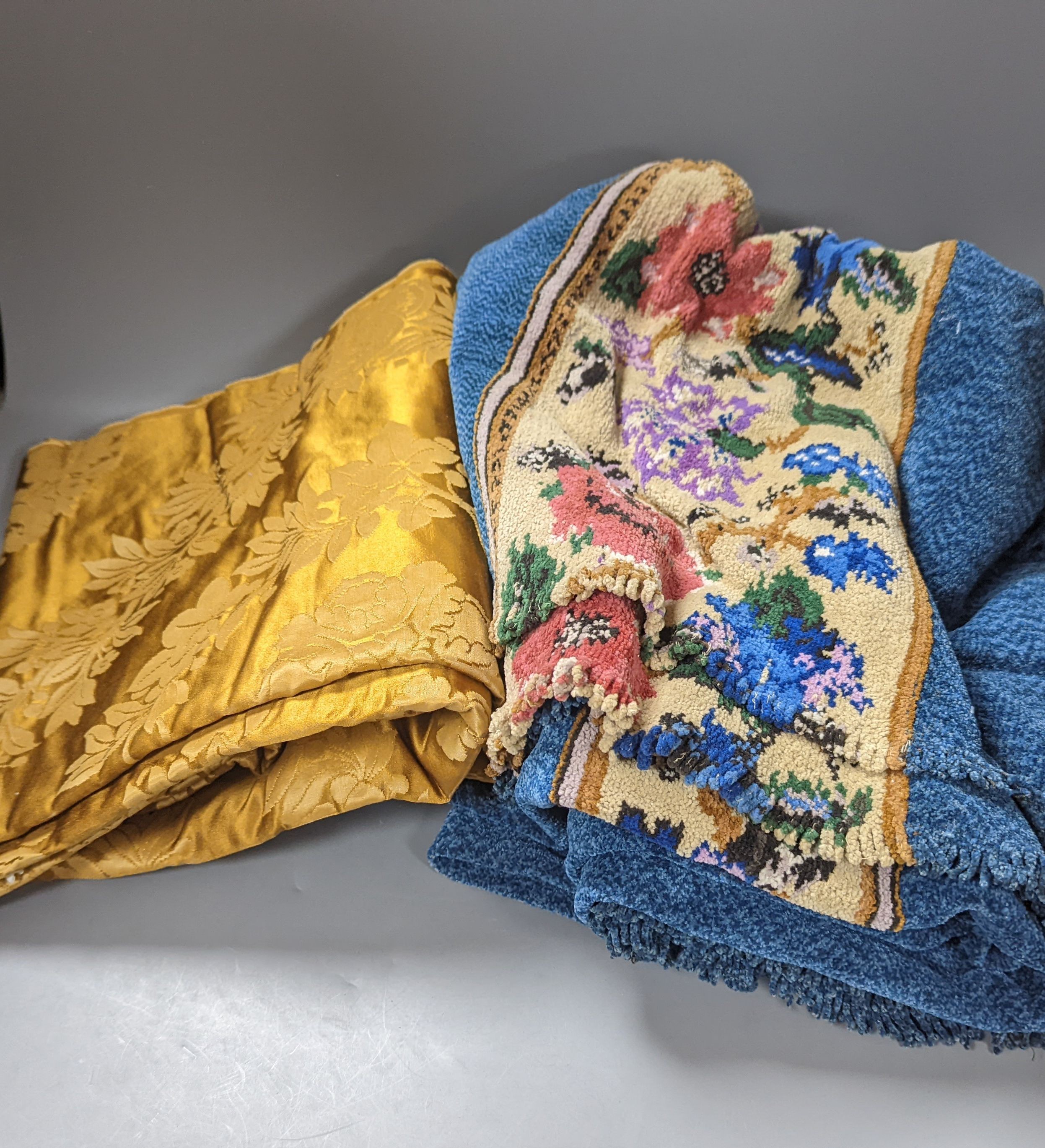 A length of 19th century damask, a 1930's chenille curtain and a collection of tasselled tie backs